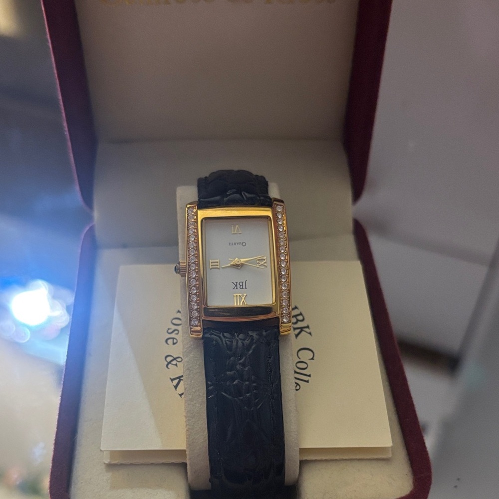 Elegant Black and Gold Women's Watch